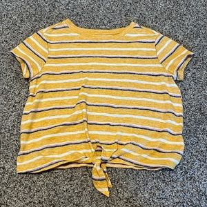 Cute basic tee shirt. Size: small. Color: yellow, and others.